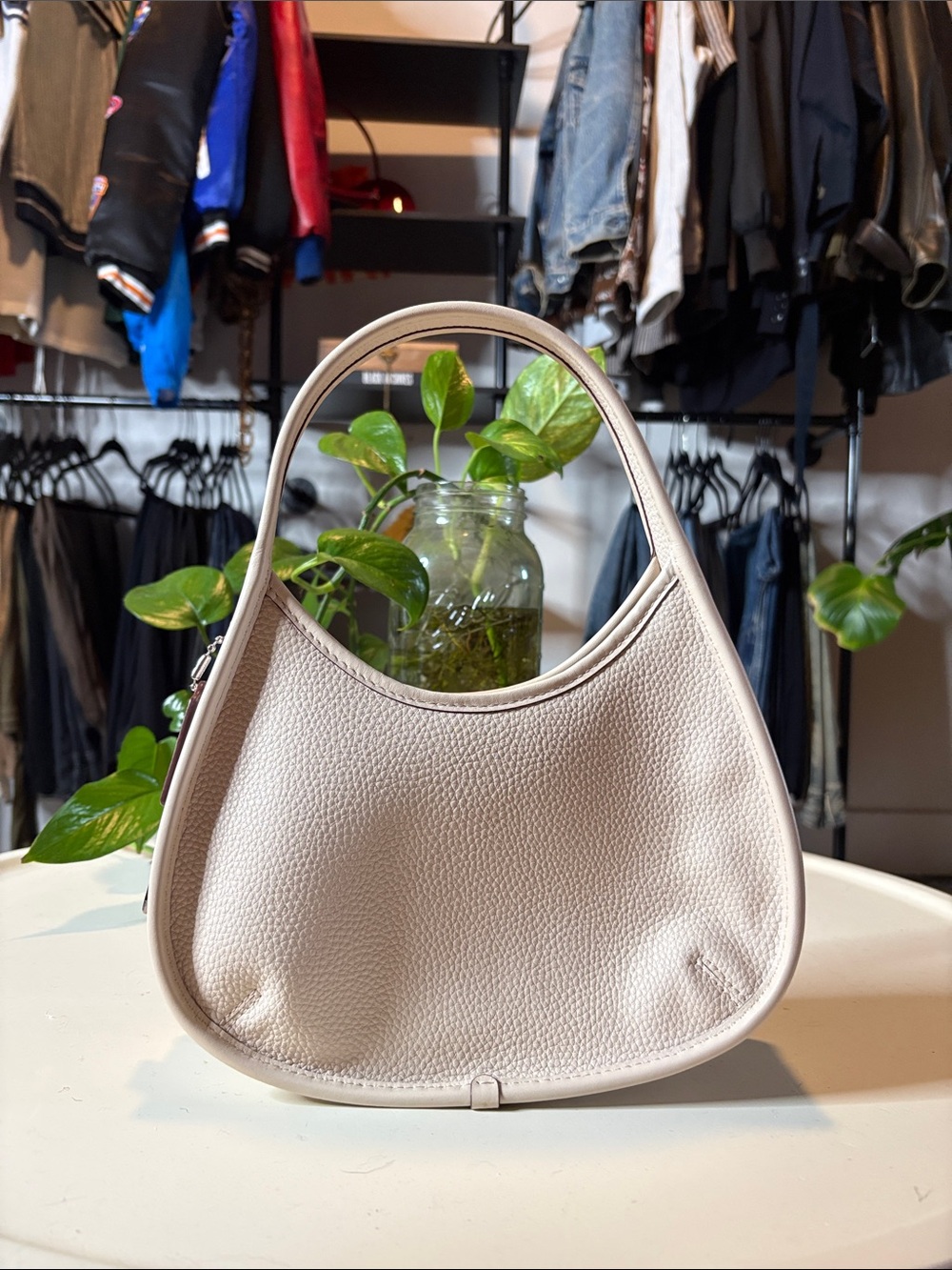 Pebbled Leather Crescent Wristlet Clutch in Light Beige